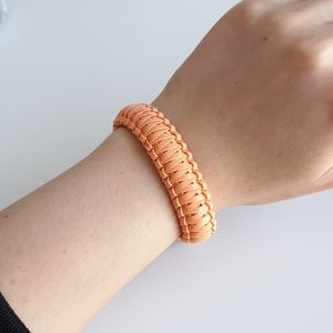 Peach gimp bracelet with gold chain